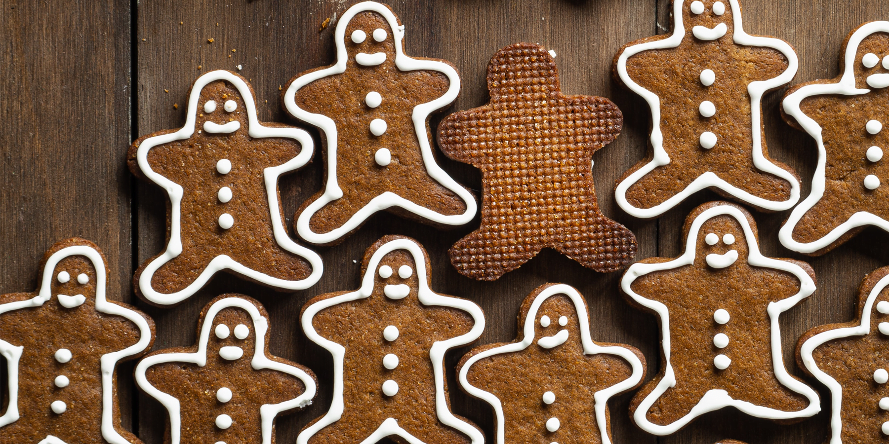 A cluster of smiling gingerbread people